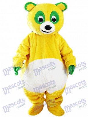 Gelber Bär mit grünen Augen Maskottchen Kostüm Cartoon Tier